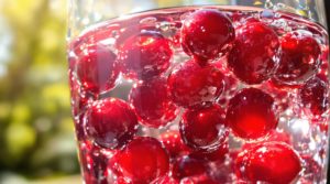 Cherries in a glass of water